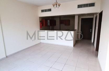 Apartment - 1 Bedroom - 2 Bathrooms for rent in Building IC1-EMR-12 - Emirates Cluster - International City - Dubai