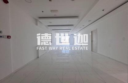 Office Space - Studio - 1 Bathroom for rent in Indigo Optima - Indigo Towers - International City - Dubai