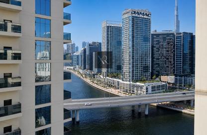 Apartment - 1 - 1 for sale in Mayfair Residency - Business Bay - Dubai