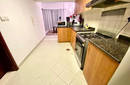 Apartment - 1 Bedroom - 2 Bathrooms for sale in Cricket Tower - Dubai Sports City - Dubai