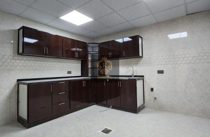 Apartment - 2 Bedrooms - 2 Bathrooms for rent in Mohamed Bin Zayed City - Abu Dhabi