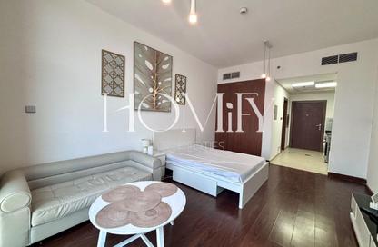 Apartment - Studio - 1 for rent in National Bonds Residence - District 15 - Jumeirah Village Circle - Dubai