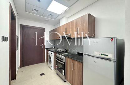 Apartment - Studio - 1 for rent in National Bonds Residence - District 15 - Jumeirah Village Circle - Dubai