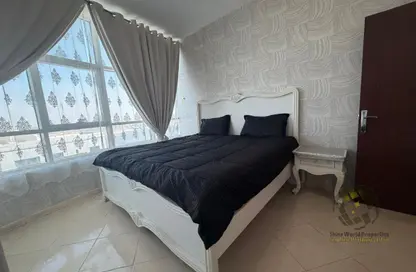 Apartment - 2 Bedrooms - 2 Bathrooms for sale in Orient Tower 2 - Orient Towers - Al Bustan - Ajman