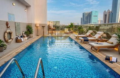 Apartment - 1 Bedroom - 2 Bathrooms for rent in Jumeirah Garden City - Al Satwa - Dubai