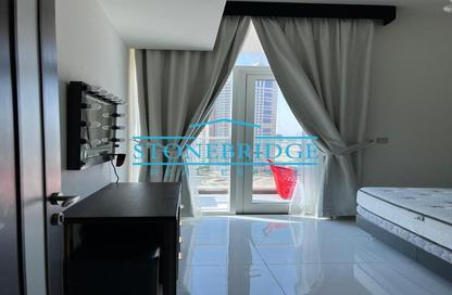 Apartment - 1 - 2 for sale in Miraclz Tower by Danube - Arjan - Dubai