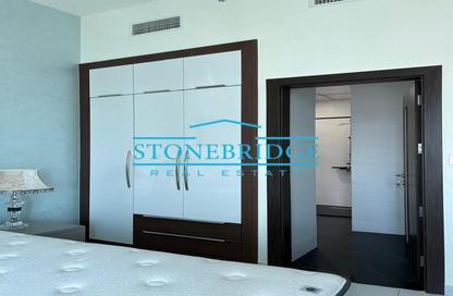 Apartment - 1 - 2 for sale in Miraclz Tower by Danube - Arjan - Dubai