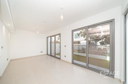 Villa - 4 - 5 for rent in Aura Gardens - Tilal Al Ghaf - Dubai
