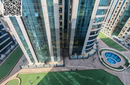 شقة - غرفة نوم - 2 حمامات للبيع في أورينت تاور 1 - أورينت تاور - البستان - عجمان