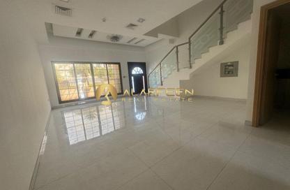 Villa - 4 Bedrooms - 5 Bathrooms for rent in District 13 - Jumeirah Village Circle - Dubai
