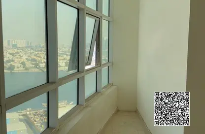 Apartment - 1 Bedroom - 2 Bathrooms for sale in Orient Towers - Al Bustan - Ajman