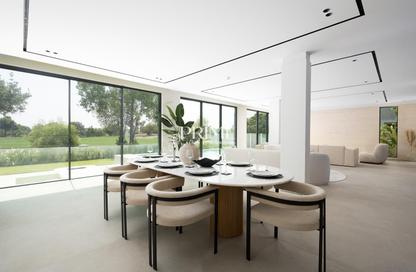 Villa - 5 - 6 for sale in Wildflower - Jumeirah Golf Estates - Dubai