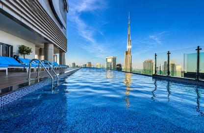 Apartment - 1 - 1 for rent in Paramount Tower Hotel  and  Residences - Business Bay - Dubai