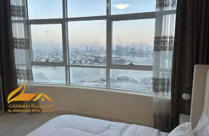 شقة - غرفة نوم - 2 حمامات للبيع في أورينت تاور 1 - أورينت تاور - البستان - عجمان