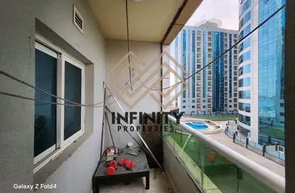 شقة - غرفة نوم - 2 حمامات للبيع في أورينت تاور 1 - أورينت تاور - البستان - عجمان