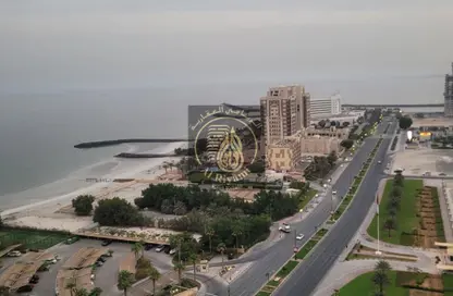 Apartment - 1 Bedroom - 2 Bathrooms for rent in Corniche Tower - Ajman Corniche Road - Ajman