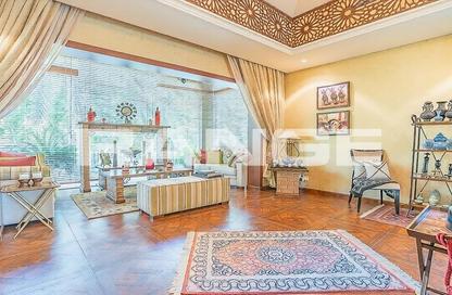 Villa - 4 Bedrooms - 5 Bathrooms for sale in Bungalow Area - Green Community Motor City - Motor City - Dubai