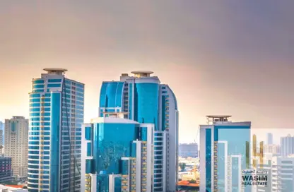 Apartment - 2 Bedrooms - 2 Bathrooms for sale in Orient Towers - Al Bustan - Ajman