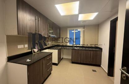 Apartment - 3 - 4 for sale in Tower 28 - Al Reef Downtown - Al Reef - Abu Dhabi