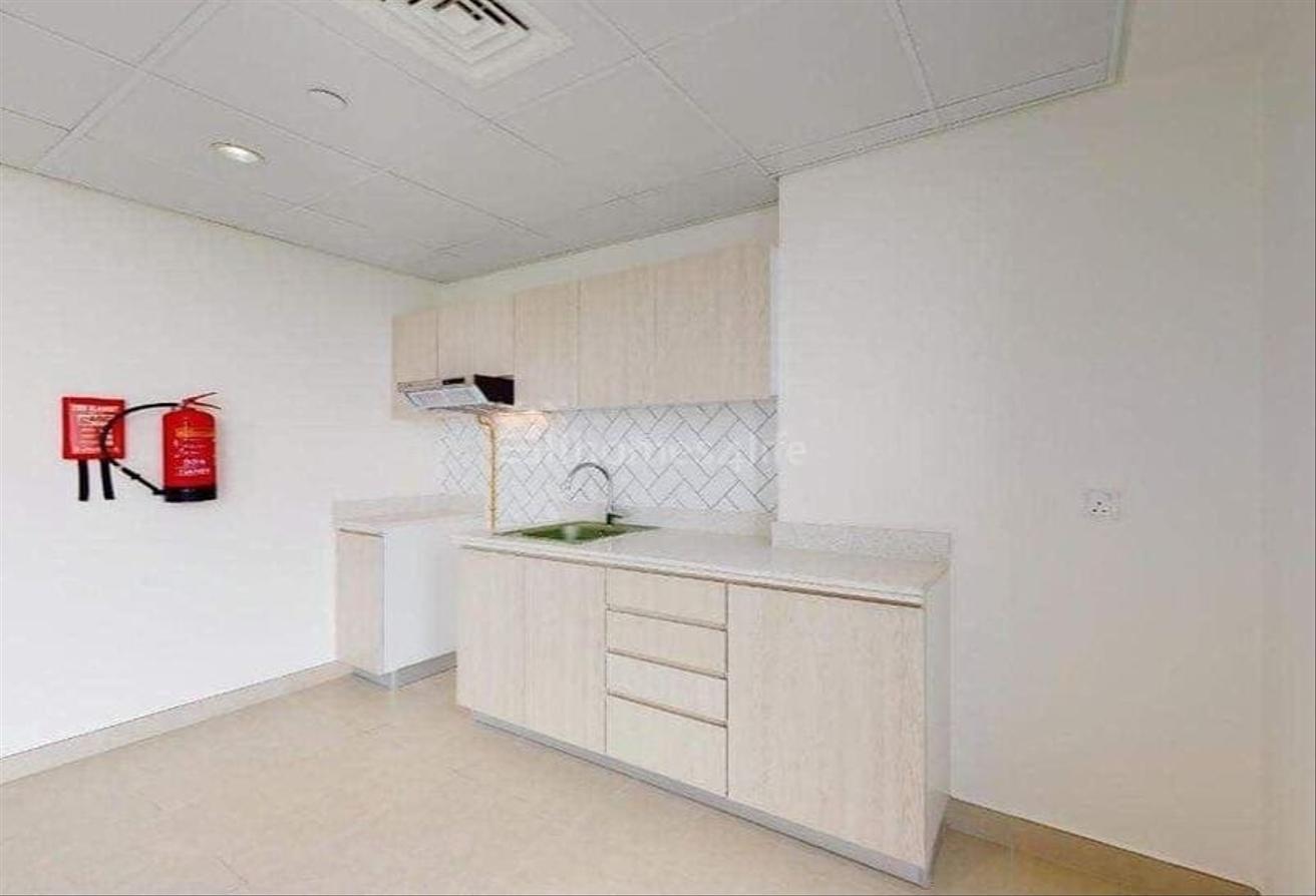 High Floor | Community View | Spacious photo 9