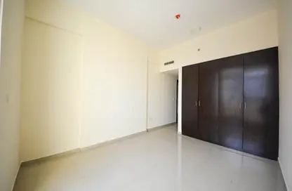 شقة - غرفة نوم - 2 حمامات للايجار في برج فرانكفورت - مدينة دبي الرياضية - دبي