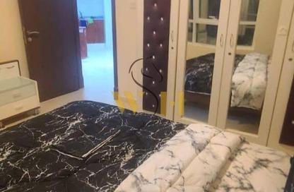شقة - غرفة نوم - 2 حمامات للبيع في أورينت تاور 1 - أورينت تاور - البستان - عجمان