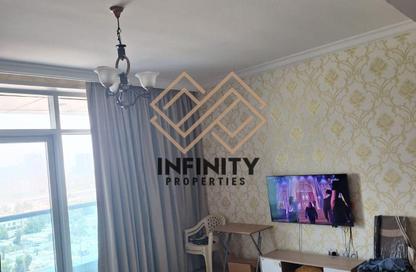 Apartment - 1 Bedroom - 2 Bathrooms for sale in Cornish Tower - Al Rumaila - Ajman