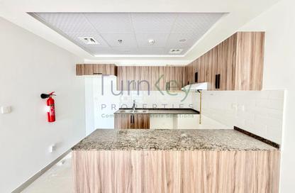 Apartment - 1 - 2 for rent in El Oneis 1 - Dubai Studio City - Dubai