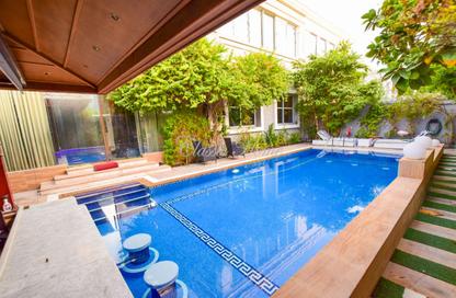 Villa - 3 - 7 for sale in Western Residence South - Falcon City of Wonders - Dubai