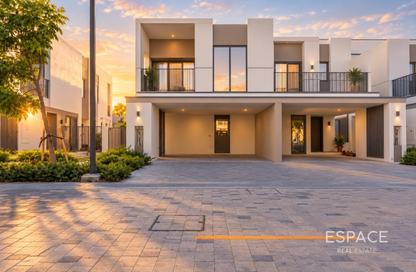 Townhouse - 4 - 4 for sale in Aura Gardens - Tilal Al Ghaf - Dubai
