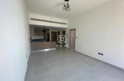 Apartment - 1 Bedroom - 2 Bathrooms for rent in Burj Residence 2 - District 10 - Jumeirah Village Circle - Dubai