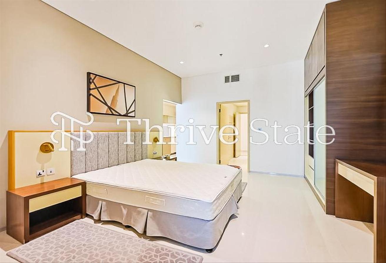 Elegant Furnished 2BR with SZR Skyline View photo 21