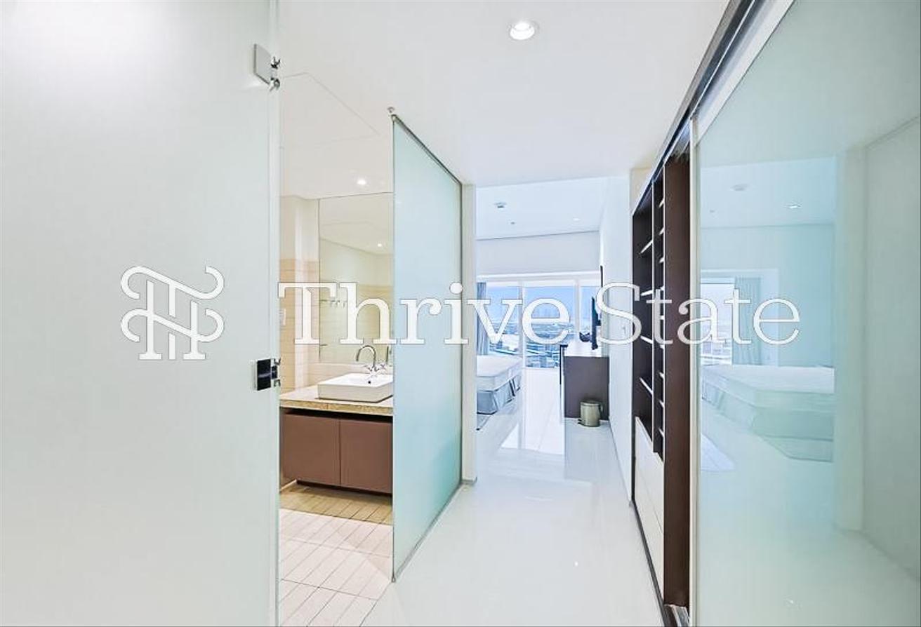 Elegant Furnished 2BR with SZR Skyline View photo 15