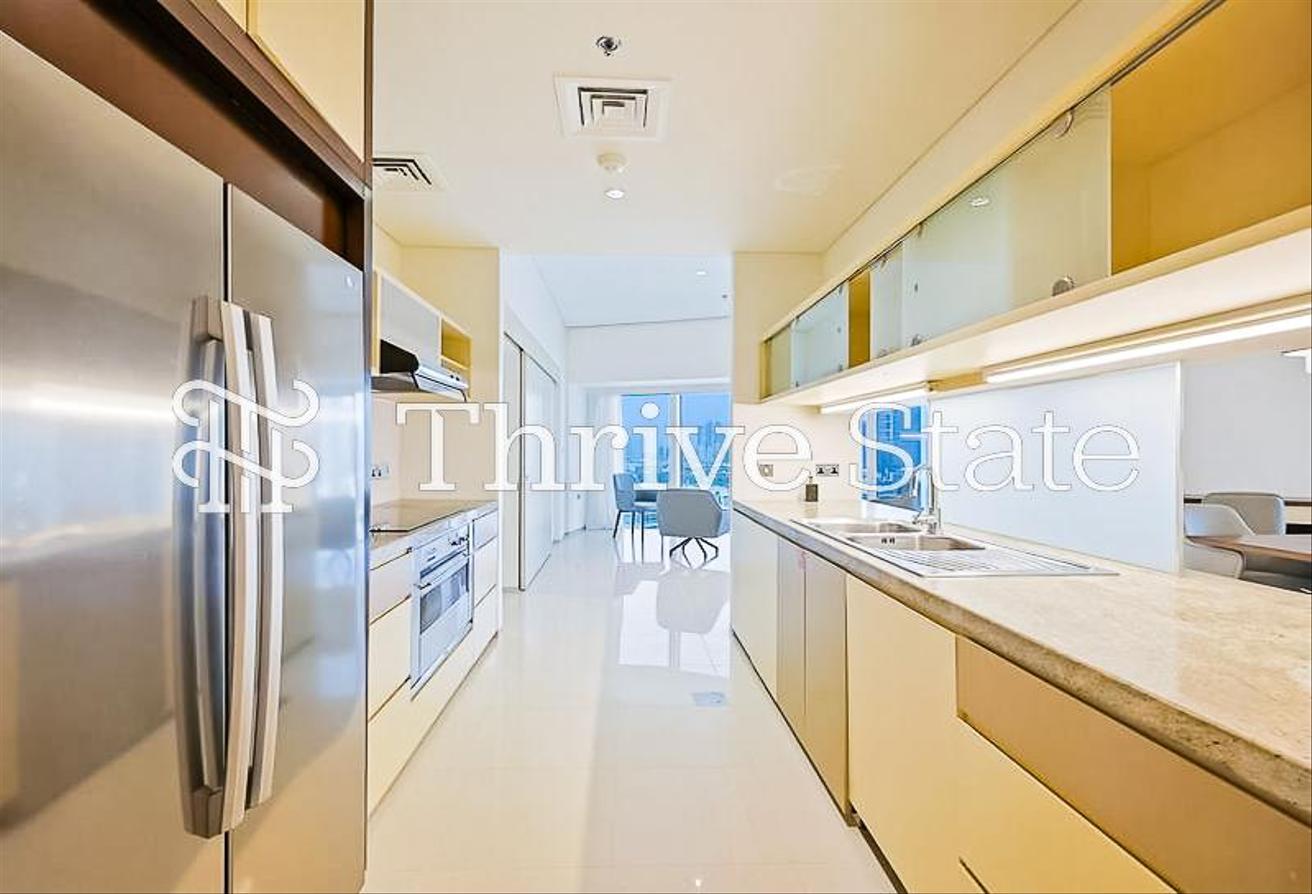 Elegant Furnished 2BR with SZR Skyline View photo 12
