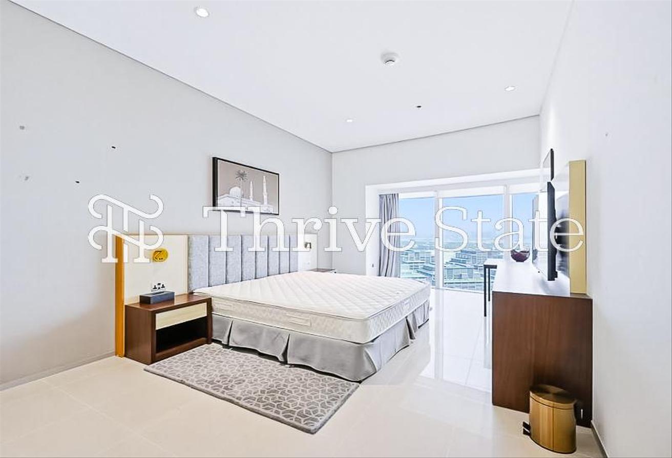 Elegant Furnished 2BR with SZR Skyline View photo 16
