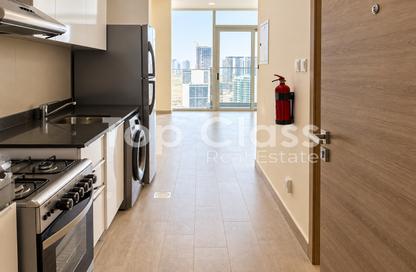 Apartment - Studio - 1 for rent in Bloom Heights A - Bloom Heights - District 15 - Jumeirah Village Circle - Dubai