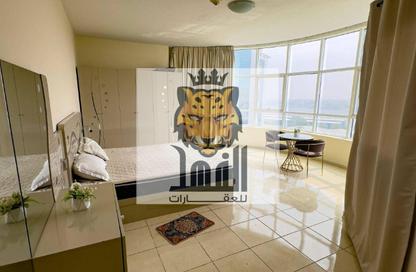 شقة - 1 - 1 للايجار في أورينت تاور 2 - أورينت تاور - البستان - عجمان