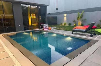 Villa - 4 - 5 for sale in Robinia - Masaar - Tilal City - Sharjah