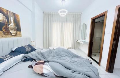 Apartment - 1 - 2 for sale in BNH Smart Tower 3 - International City Phase 2 - Al Warsan 4 - Al Warsan - Dubai