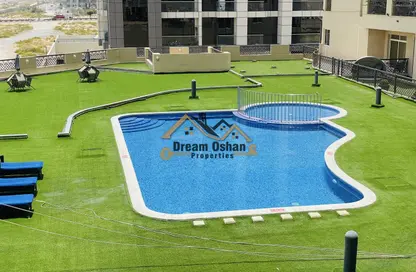 Apartment - 1 Bedroom - 2 Bathrooms for rent in Al Thuraya Building - Dubai Silicon Oasis - Dubai