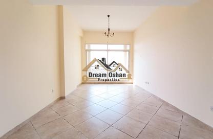 Apartment - 1 - 2 for rent in Al Thuraya Building - Dubai Silicon Oasis - Dubai
