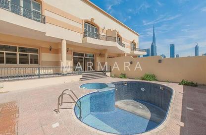 Villa - 4 Bedrooms - 5 Bathrooms for rent in Jumeirah 1 Villas - Jumeirah 1 - Jumeirah - Dubai