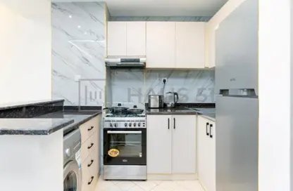 شقة - غرفة نوم - 2 حمامات للايجار في برج يونى استايت الرياضية - مدينة دبي الرياضية - دبي