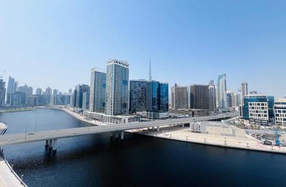 Apartment - 1 - 1 for rent in Mayfair Residency - Business Bay - Dubai