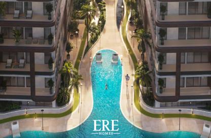 Apartment - 2 Bedrooms - 2 Bathrooms for sale in Enchante By Grid - Arjan - Dubai