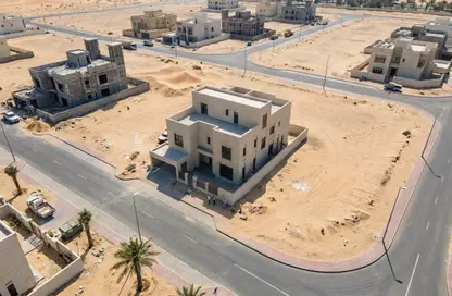 أرض - استوديو للبيع في السحمة - ضاحية الرويضات - الشارقة