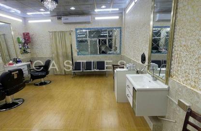Shop - Studio - 1 Bathroom for rent in Building X12 - England Cluster - International City - Dubai