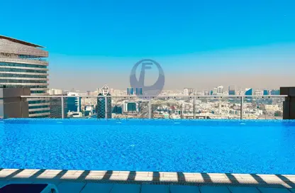 شقة - 2 غرف نوم - 3 حمامات للايجار في برج تيتانيوم - الكرامة - دبي