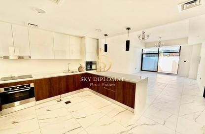Villa - 4 - 5 for sale in Elie Saab VIE Townhouses - District 11 - Mohammed Bin Rashid City - Dubai