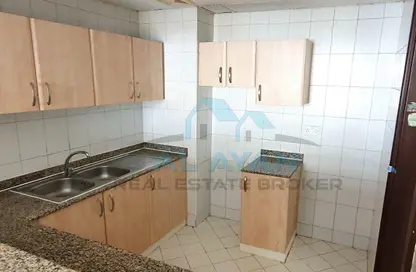 شقة - غرفة نوم - 2 حمامات للايجار في مبنى إس11 - طراز أسباني - المدينة العالمية - دبي